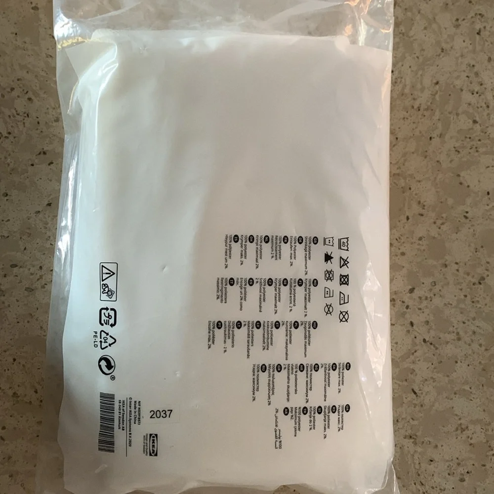 IKEA LILL curtain sheer. 2 per bag, dimensions 110” x 98”